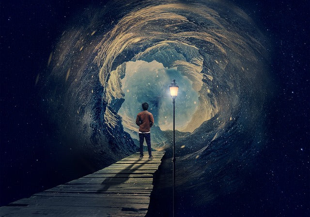 A surreal digital artwork of a man standing on a wooden pier looking into a swirling cosmic vortex tunnel under a starry night sky.
